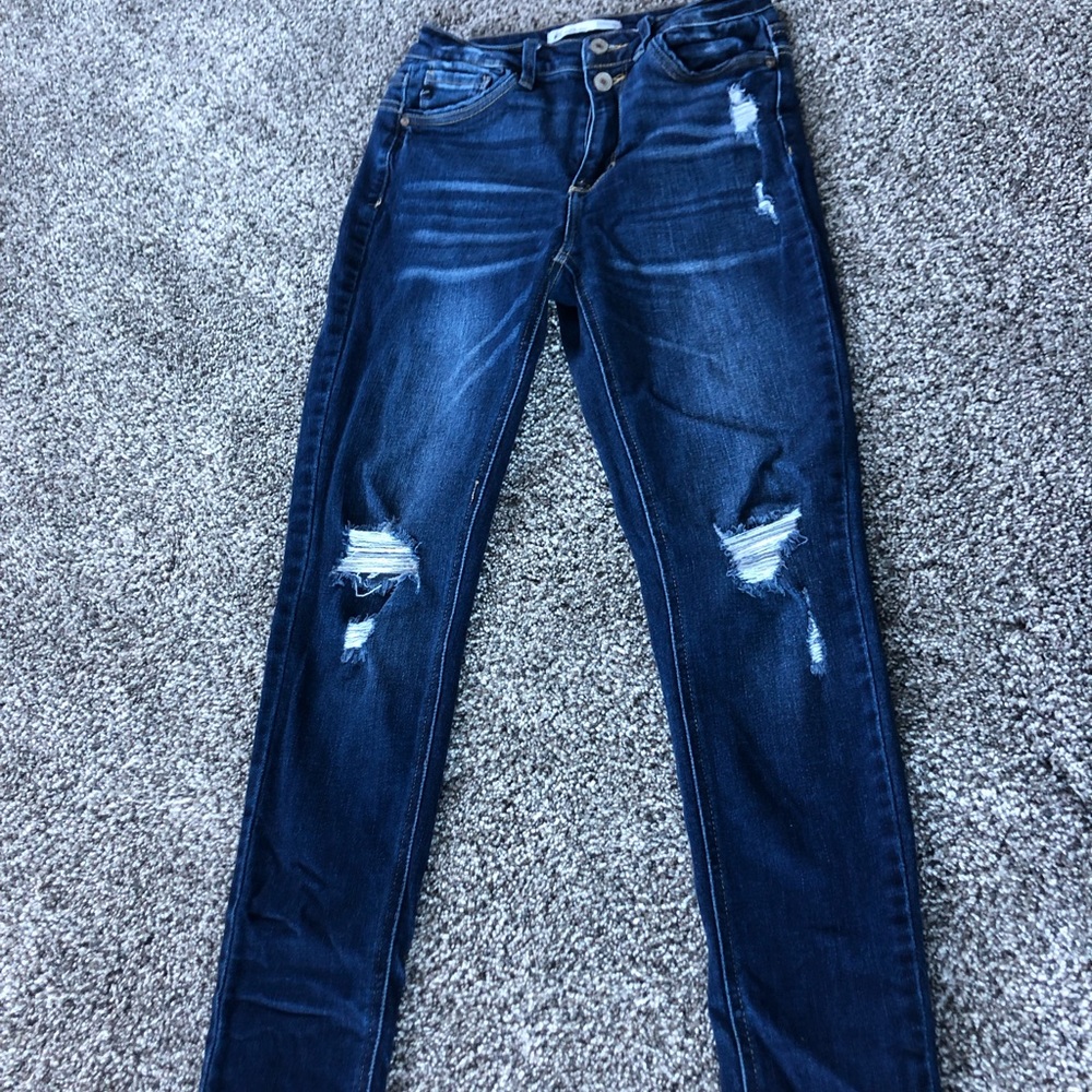 Like new Kancan jeans, nothing wrong with them. Super stretchy!